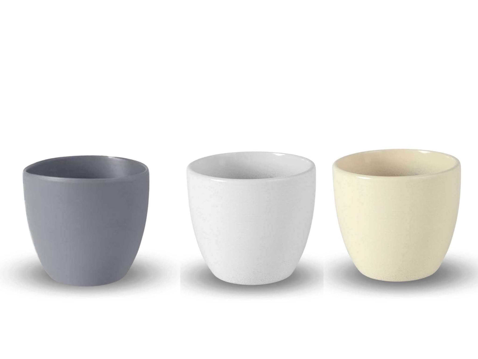A set of three decorative plant pots in varying colors: one gray, one white, and one pale yellow. Each pot features a smooth, glossy finish and a rounded shape, ideal for enhancing indoor plant displays.