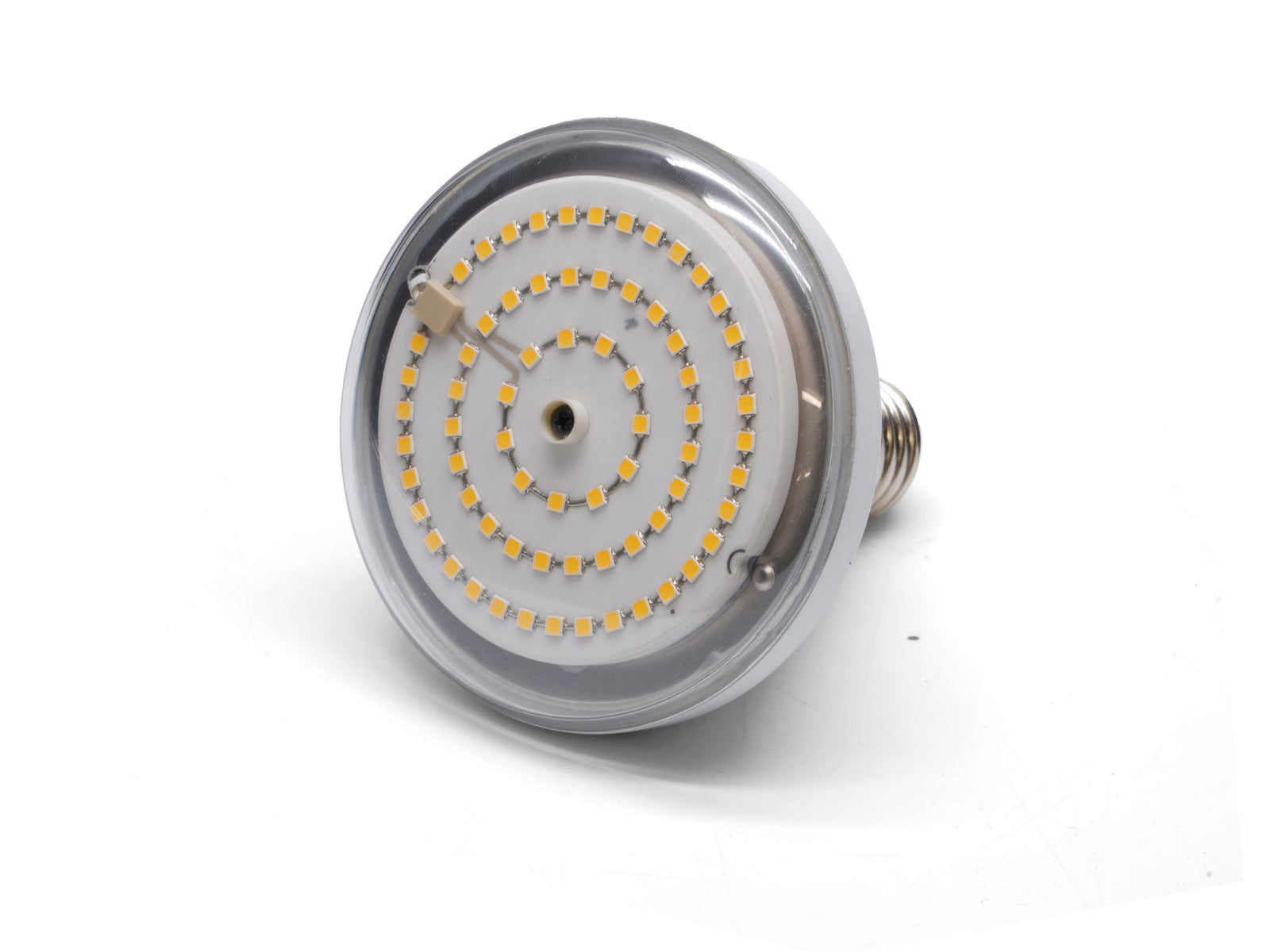A close-up view of an LED grow lamp features a circular design with numerous small yellow LED lights arranged in a spiral pattern.