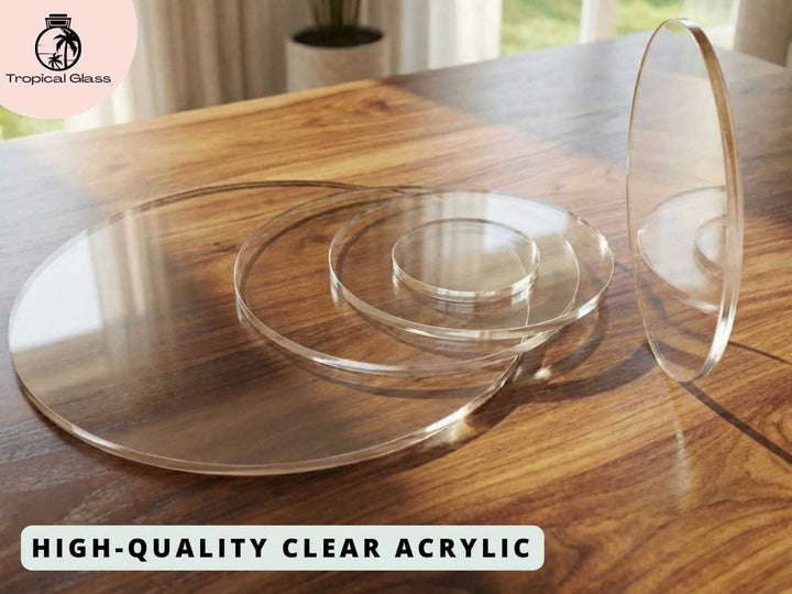 Clear acrylic disc lid with smooth edges shown on a wooden surface.