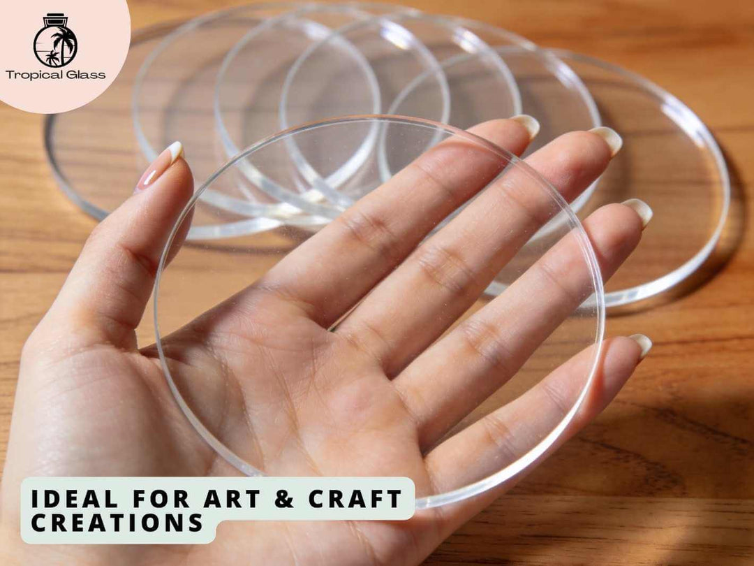 Clear acrylic round terrarium lid shown in hand, ideal for craft and DIY projects.