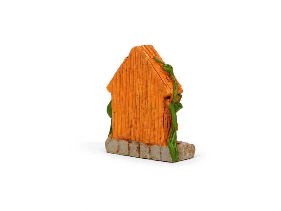 Back view of a miniature wooden fairy house terrarium decoration with green vine details