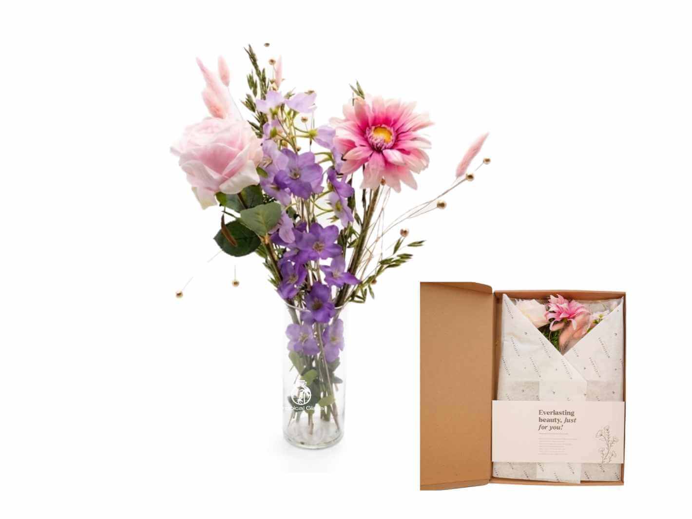 Bouquet of flowers in a clear vase made out of preserved flowers in pink colour