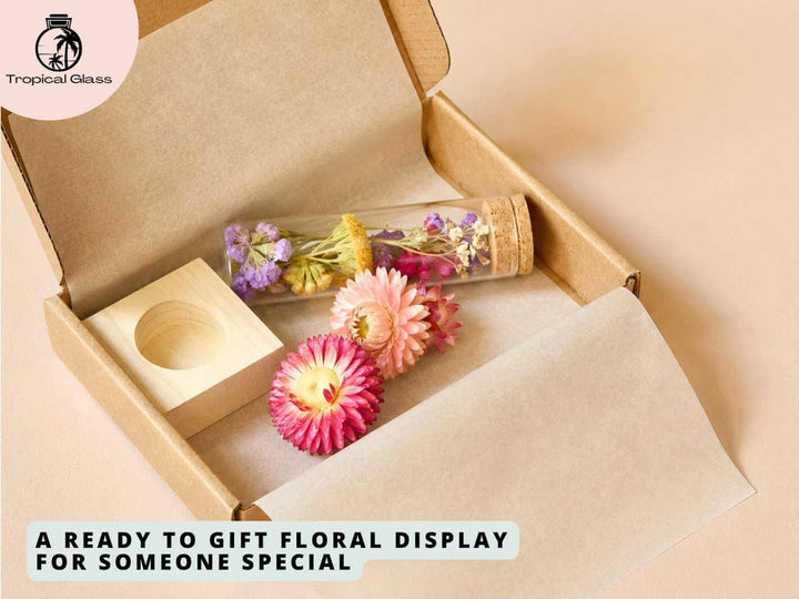 Dried flower herbarium bottle with cork lid, wooden base and gift ready packaging contents