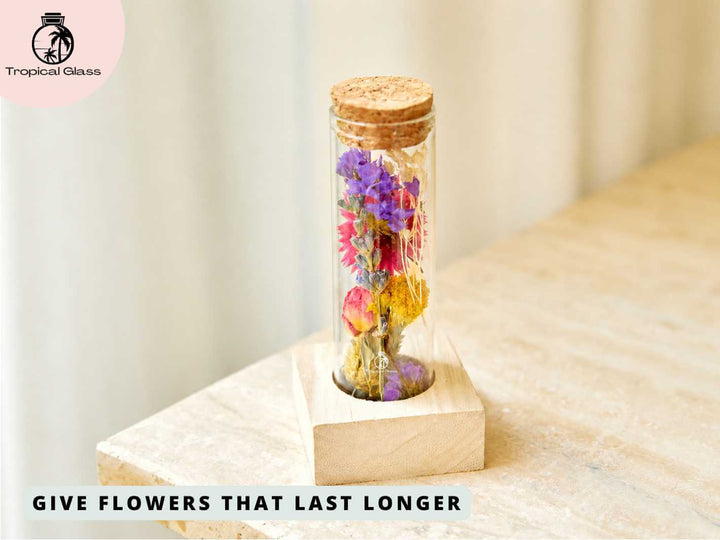 Dried flower herbarium bottle styled in a cosy home setting, perfect for shelves, desks and bedside tables