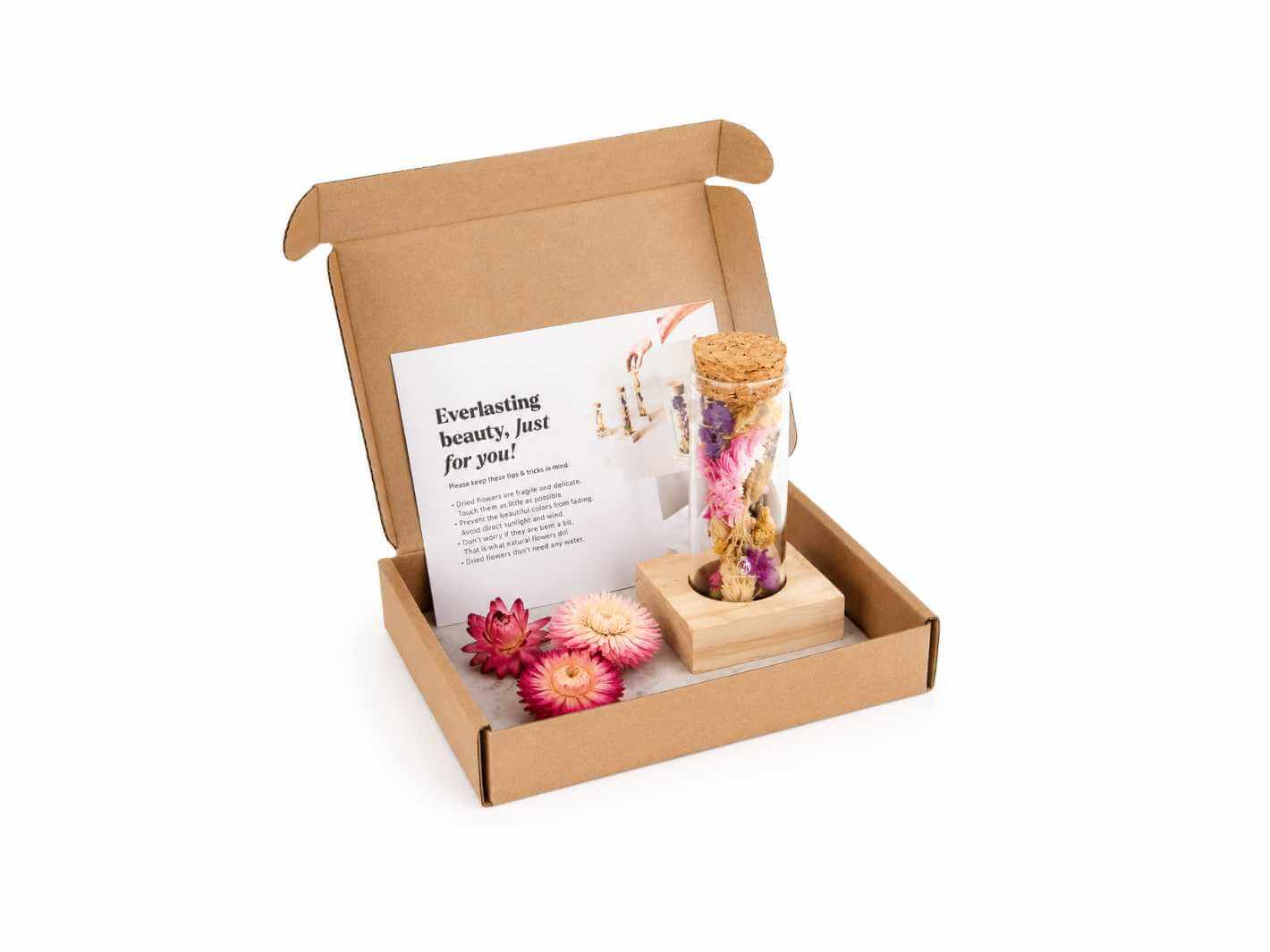 Dried flower herbarium bottle with wooden base, ready to gift floral decoration in a compact glass bottle