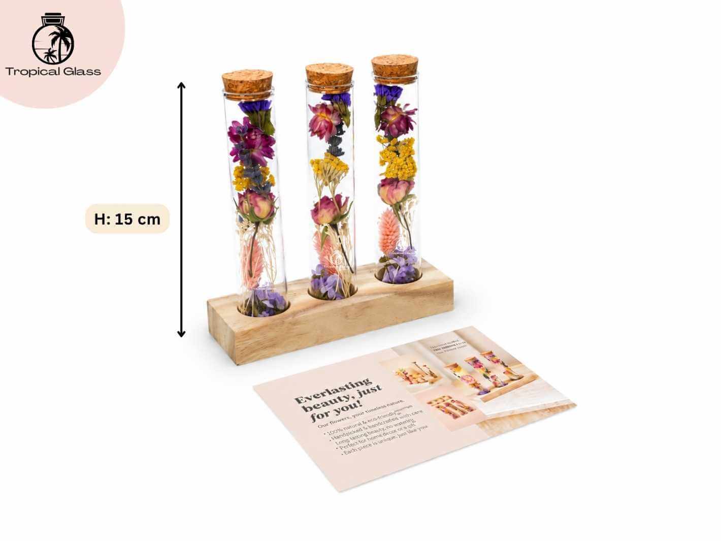 A wooden stand holds three glass test tubes filled with assorted dried flowers, showcasing vibrant colors and textures.