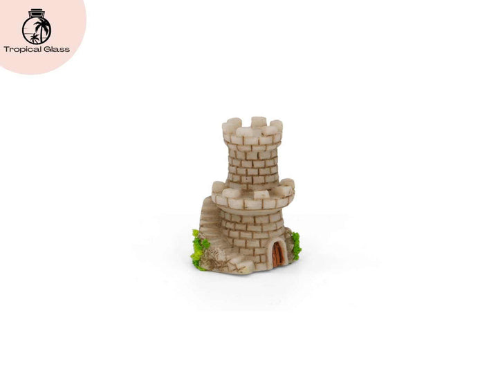Angled perspective view of the mini mossy fairy castle figurine for miniature landscapes