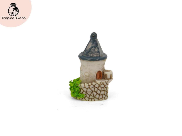 Angled perspective view of the mini fairy castle tower figurine for miniature landscapes