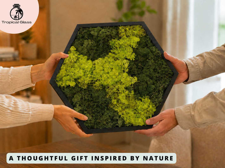 Hexagon preserved moss wall art frame being given as a thoughtful gift, showing the handmade reindeer moss texture and modern geometric design