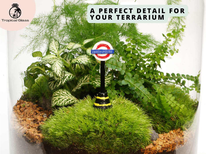 London Underground miniature figurine inside a closed terrarium environment
