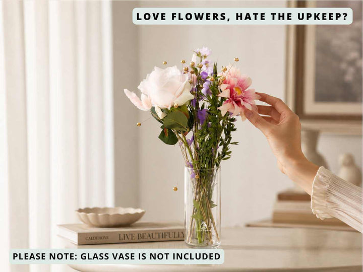 Dried and artificial flowers gift box styled in a cosy home setting as a thoughtful floral present
