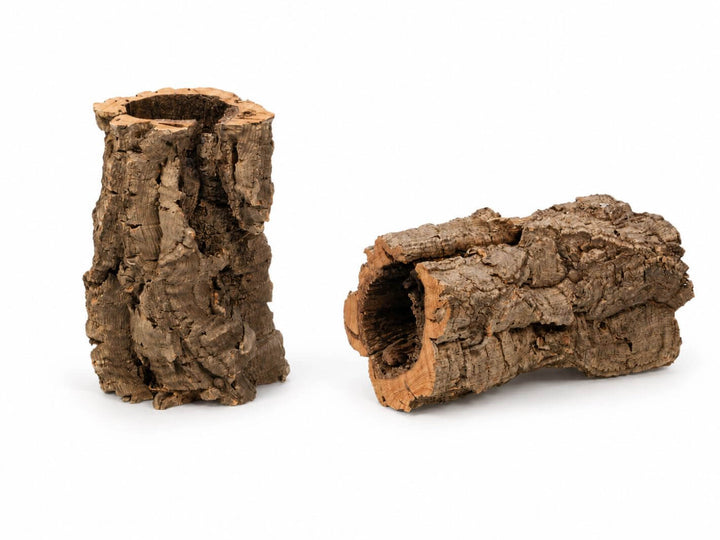Two natural cork bark pieces with hollow centers, displayed on a clean white background.