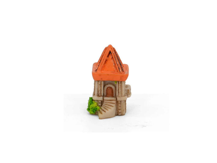 Mini castle tower figurine for fairy gardens and terrariums on a white background