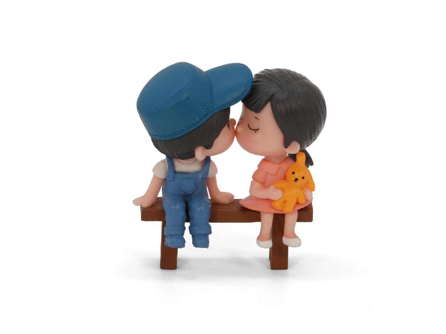 Mini couple figurine sitting on bench, front view, romantic terrarium decoration