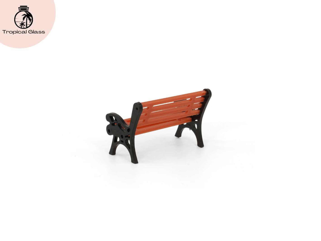Angled view of mini park bench ornament for terrarium, fairy garden and miniature landscape scenes