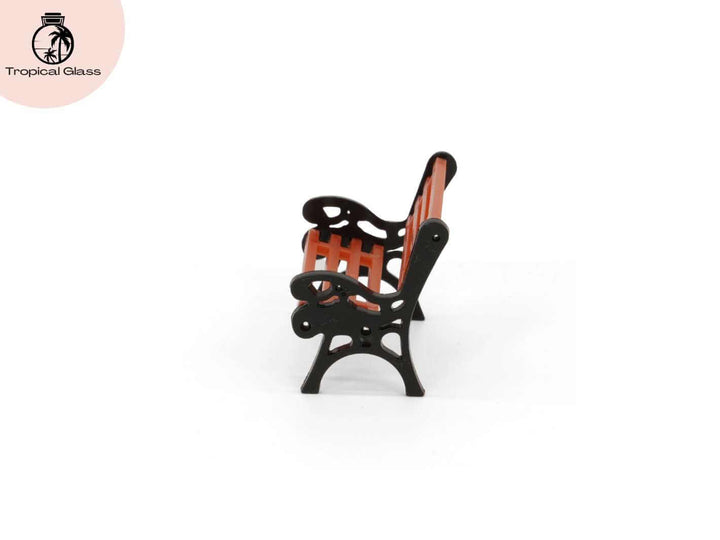 Side view of mini park bench ornament, miniature bench for fairy garden and terrarium decoration
