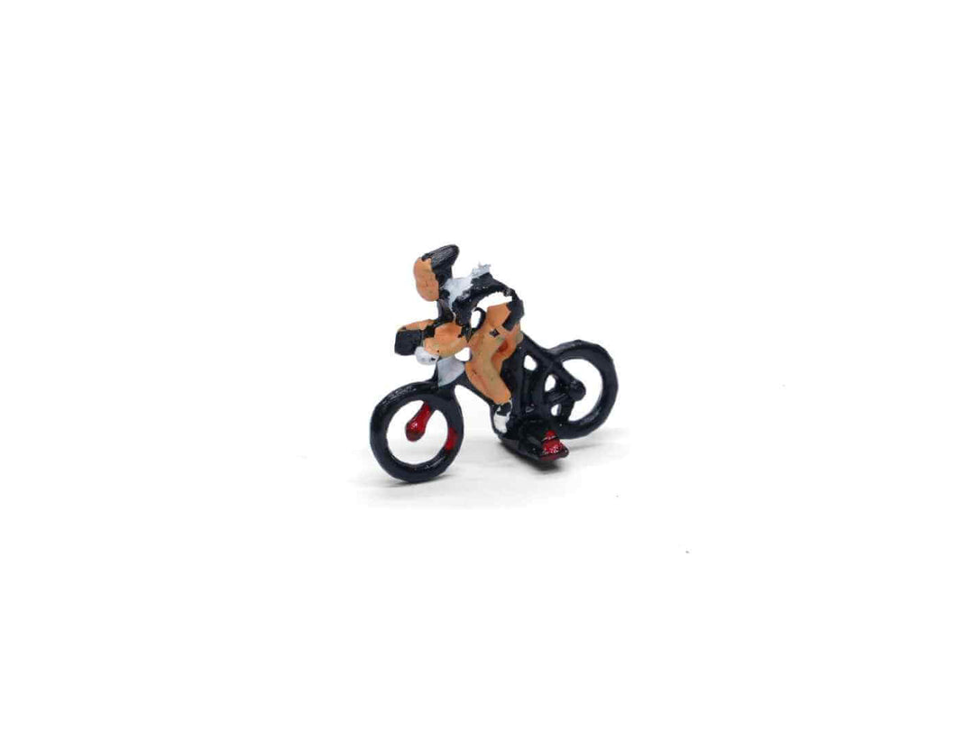 Miniature cyclist figurine, randomly selected colour, perfect for sports-themed dioramas and fairy gardens.