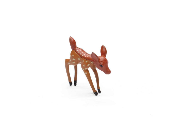 Miniature deer figurine with delicate details, perfect for terrariums, fairy gardens, and nature-themed displays.