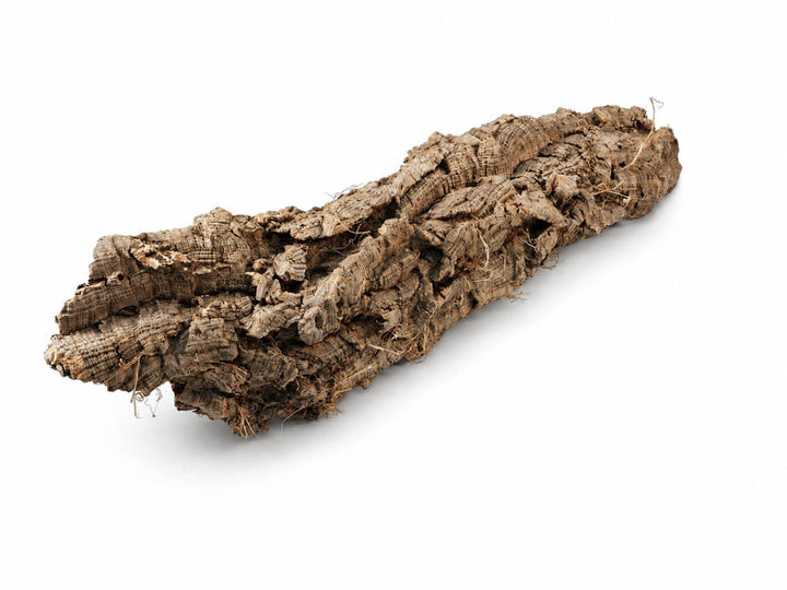 A natural cork bark piece with a highly textured, fibrous surface, shown diagonally on a clean white background.