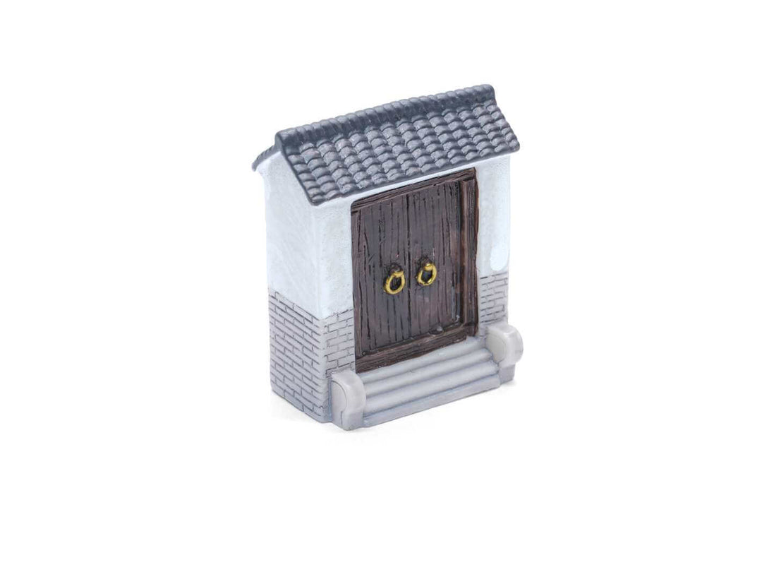 Miniature traditional door figurine with textured details, perfect for fairy gardens and dioramas.