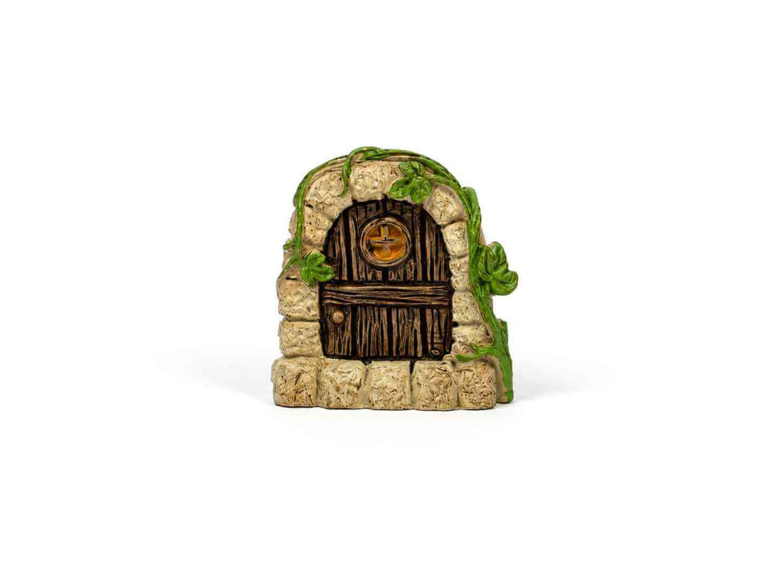 Stone fairy door terrarium ornament with a wooden door and green vines