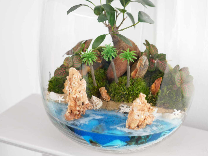 Small palm tree ornament ideal for creating a lush tropical scene in terrariums and dioramas.