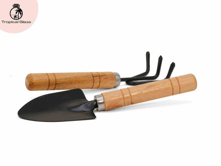 Tropical Glass mini gardening tools with shovel and rake, ideal for creating and maintaining terrariums.
