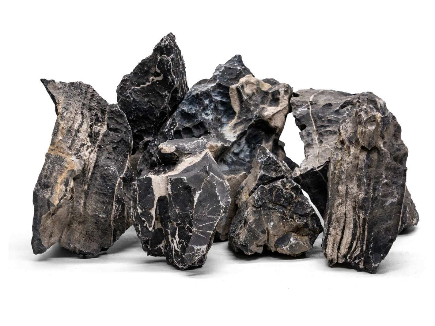 A collection of various-sized rocks with a striking blend of black and white textures, ideal for use in aquascaping, terrariums, and paludariums.
