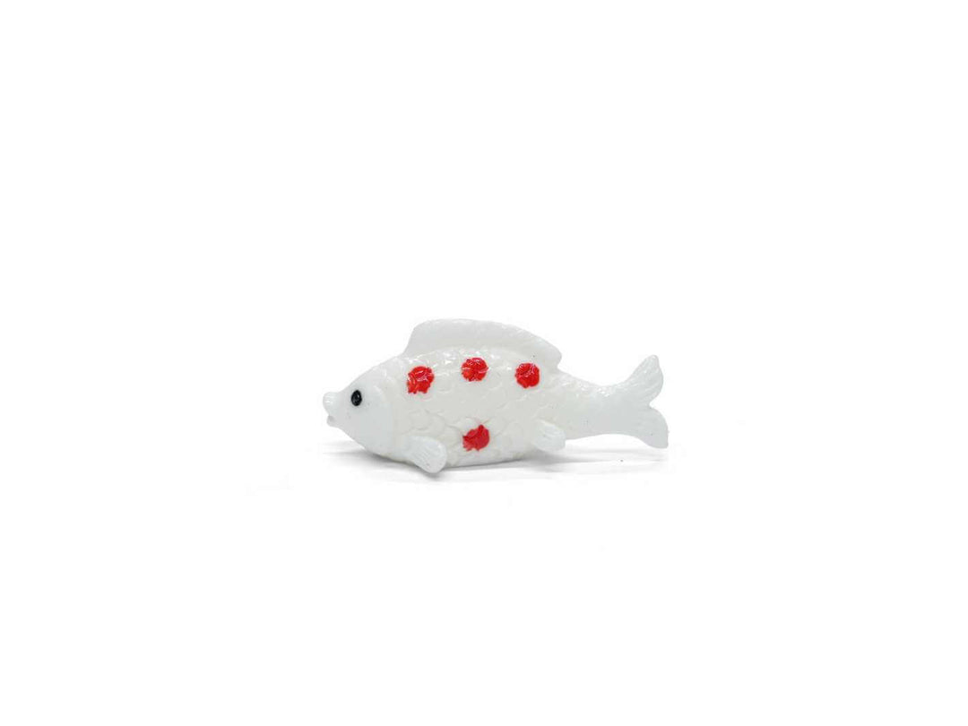 Miniature koi fish figurine with red and white details, randomly selected shape, perfect for fairy gardens.
