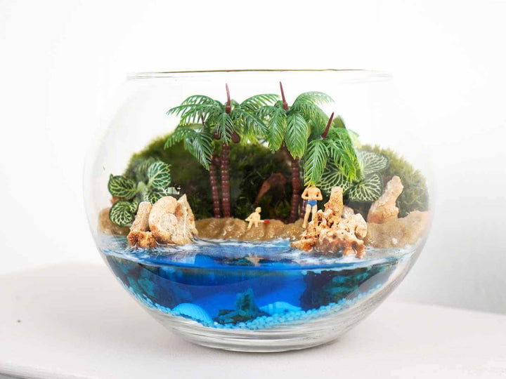 Small palm tree ornament ideal for creating a lush tropical scene in terrariums and dioramas.