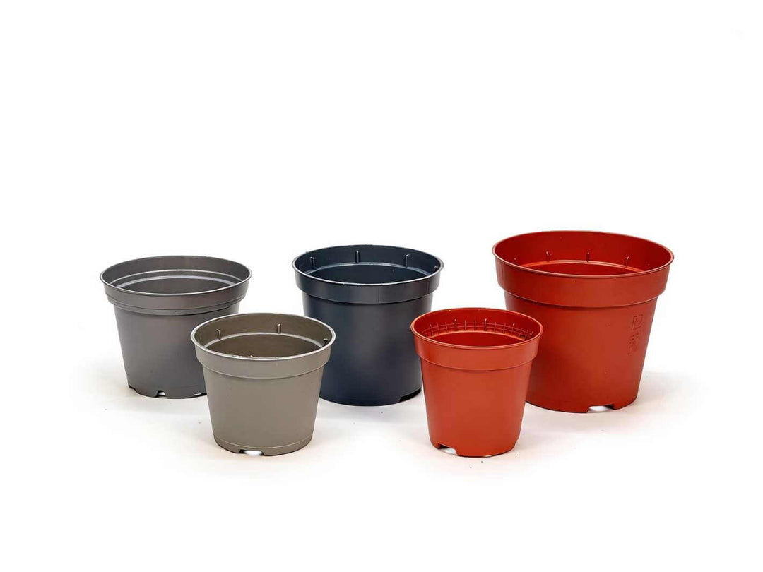 Used plastic plant pots in mixed sizes with grey tones and terracotta colours, suitable for repotting and nursery use